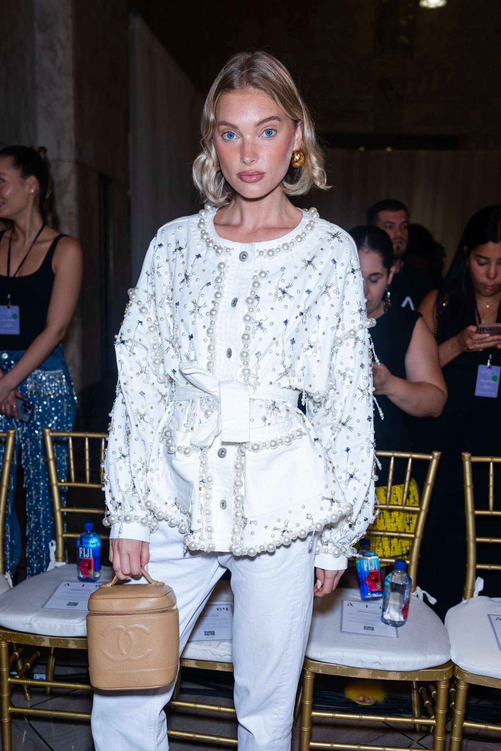 Image may contain Elsa Hosk Accessories Bag Handbag Person Purse Adult Chair Furniture Clothing and Long Sleeve