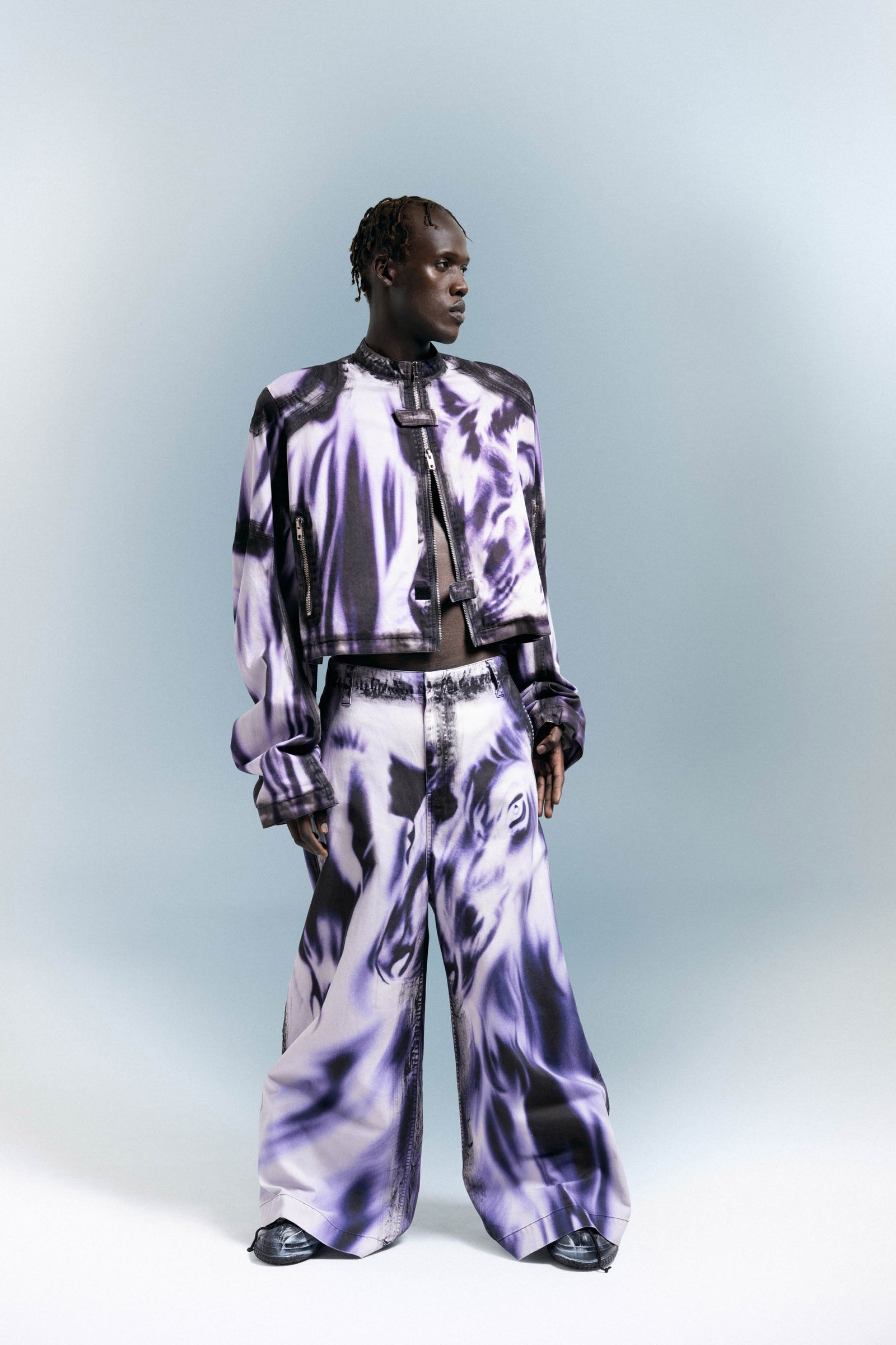 Image may contain Clothing Formal Wear Suit Adult Person Standing Footwear and Shoe