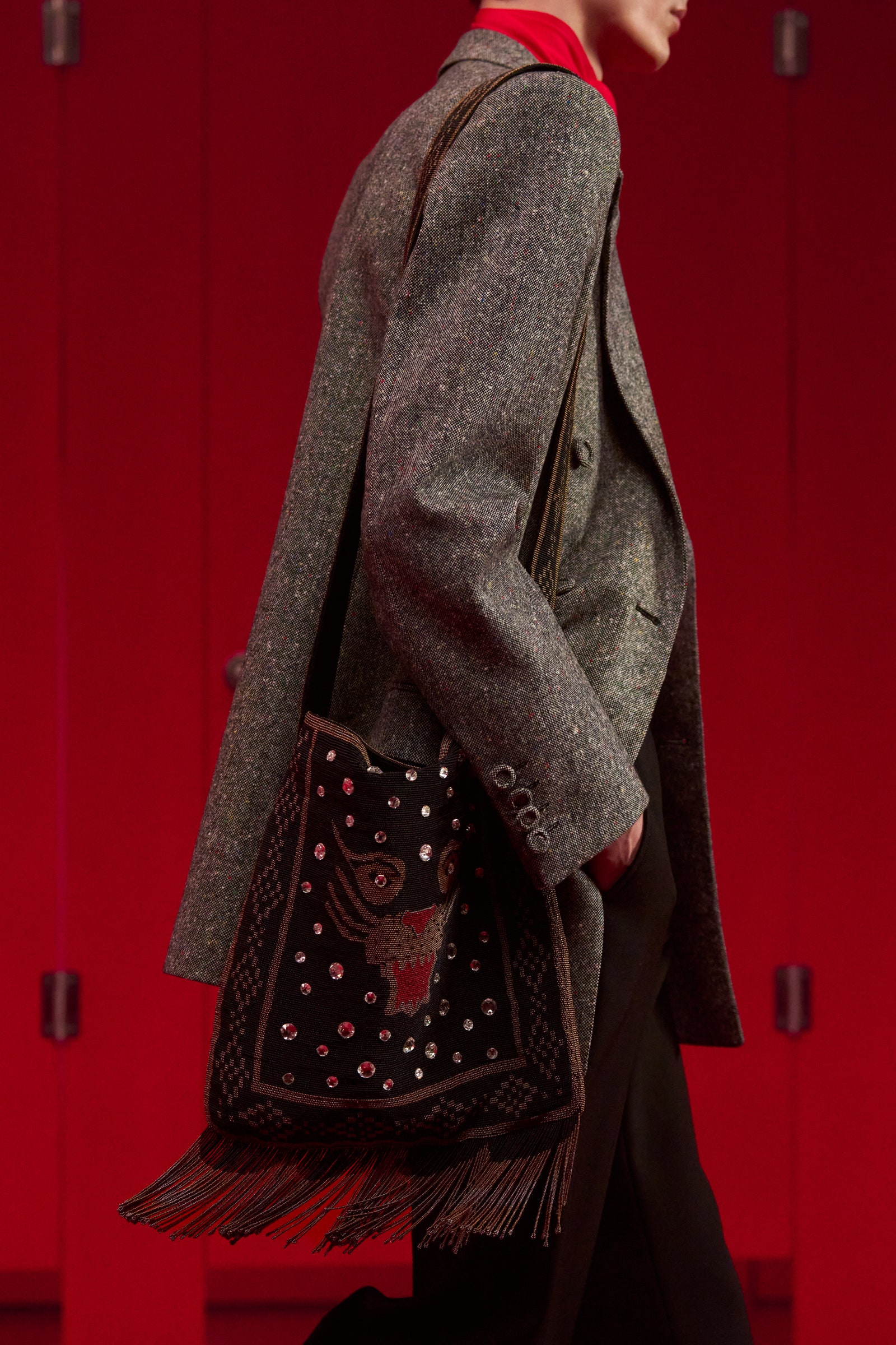 Image may contain Clothing Coat Accessories Bag Handbag Purse Overcoat Fashion Jacket Adult Person and Blazer