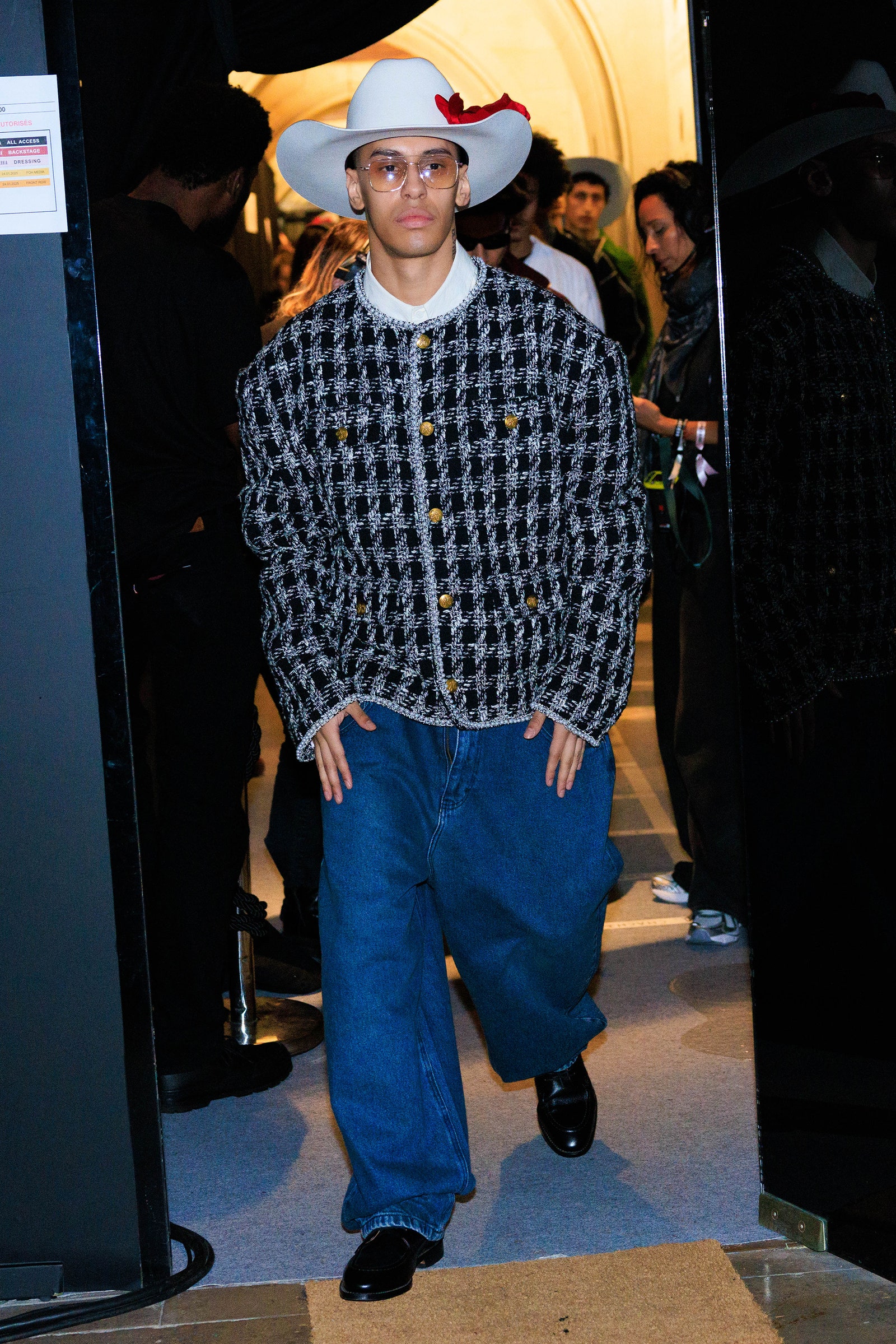 Image may contain Tamara Tunie Clothing Pants Hat Footwear Shoe Jeans Accessories Glasses Adult Person and Coat