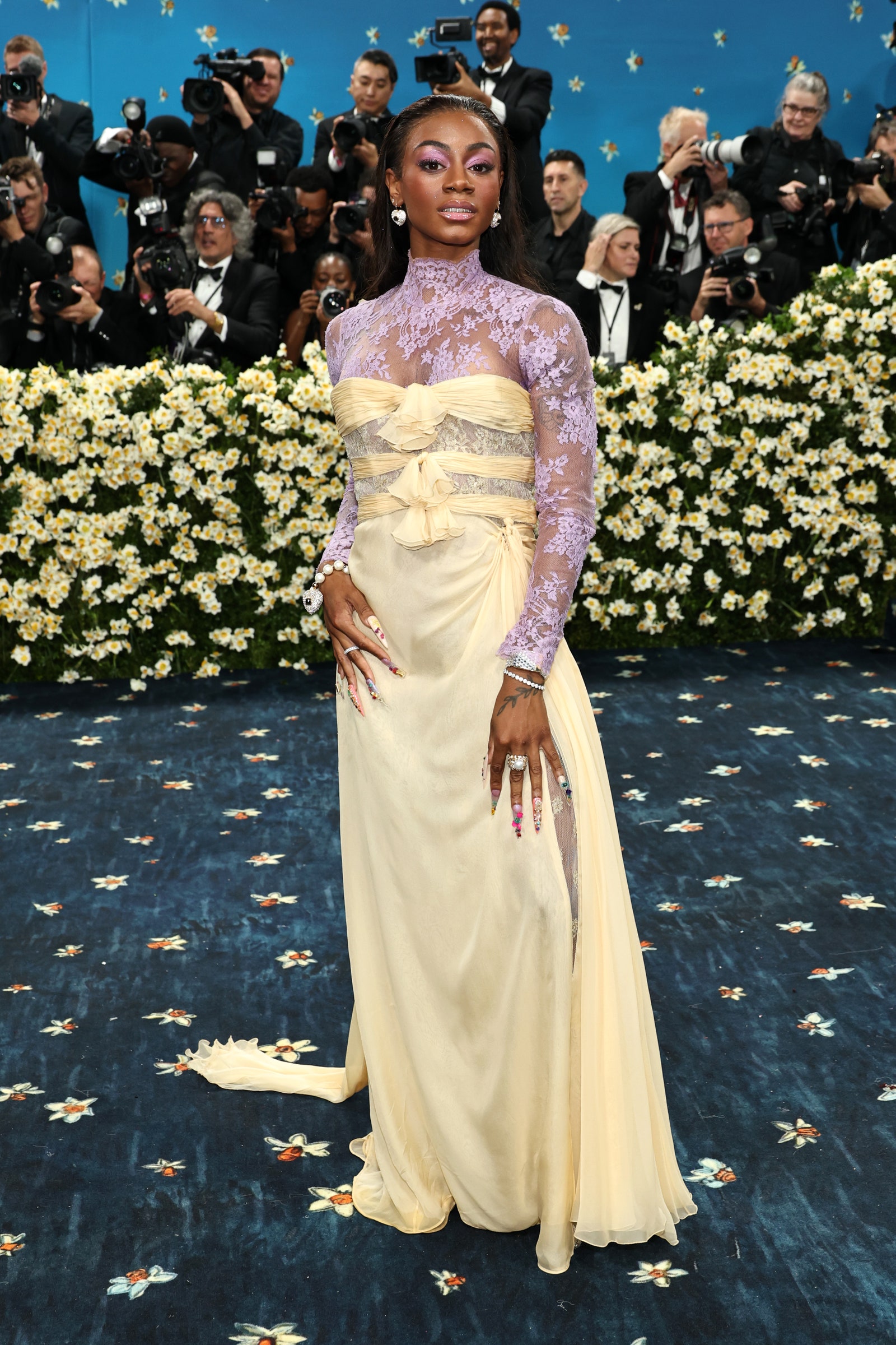 Image may contain Chen Peisi Guillermo Maripn Michaela DePrince Adrian Lewis Adult Person Fashion and Wedding