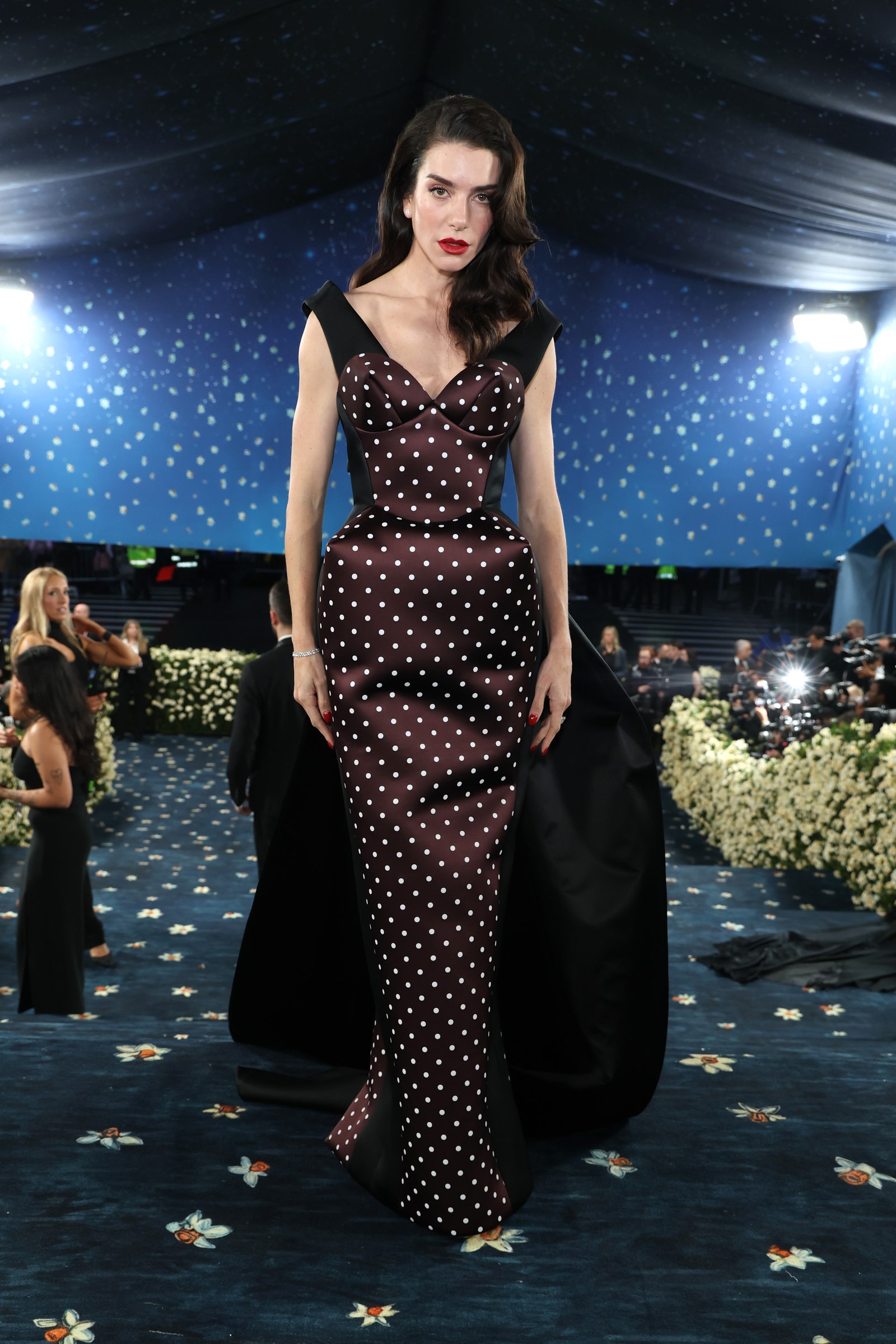 Image may contain Valentina Ferrer Adult Person Clothing Dress Pattern Formal Wear Fashion Accessories and Bag