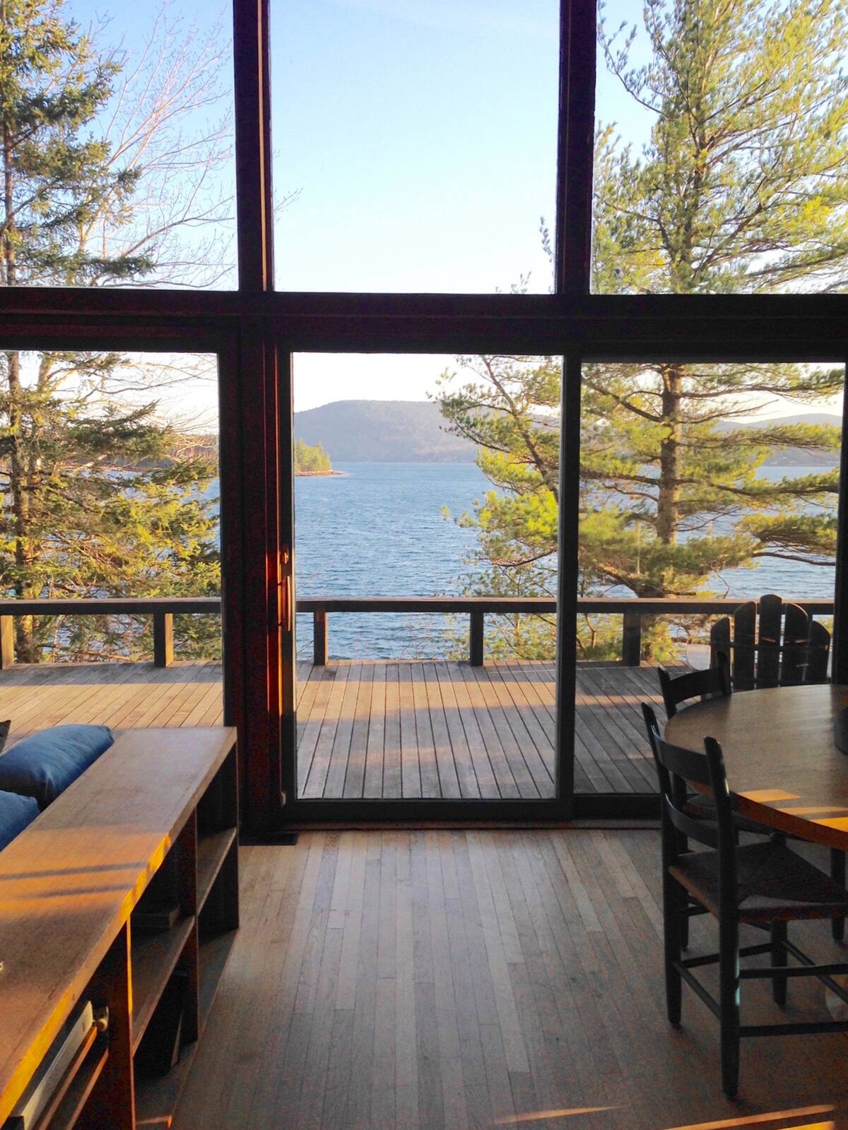 Image may contain Nature Outdoors Scenery Lakefront Chair and Furniture