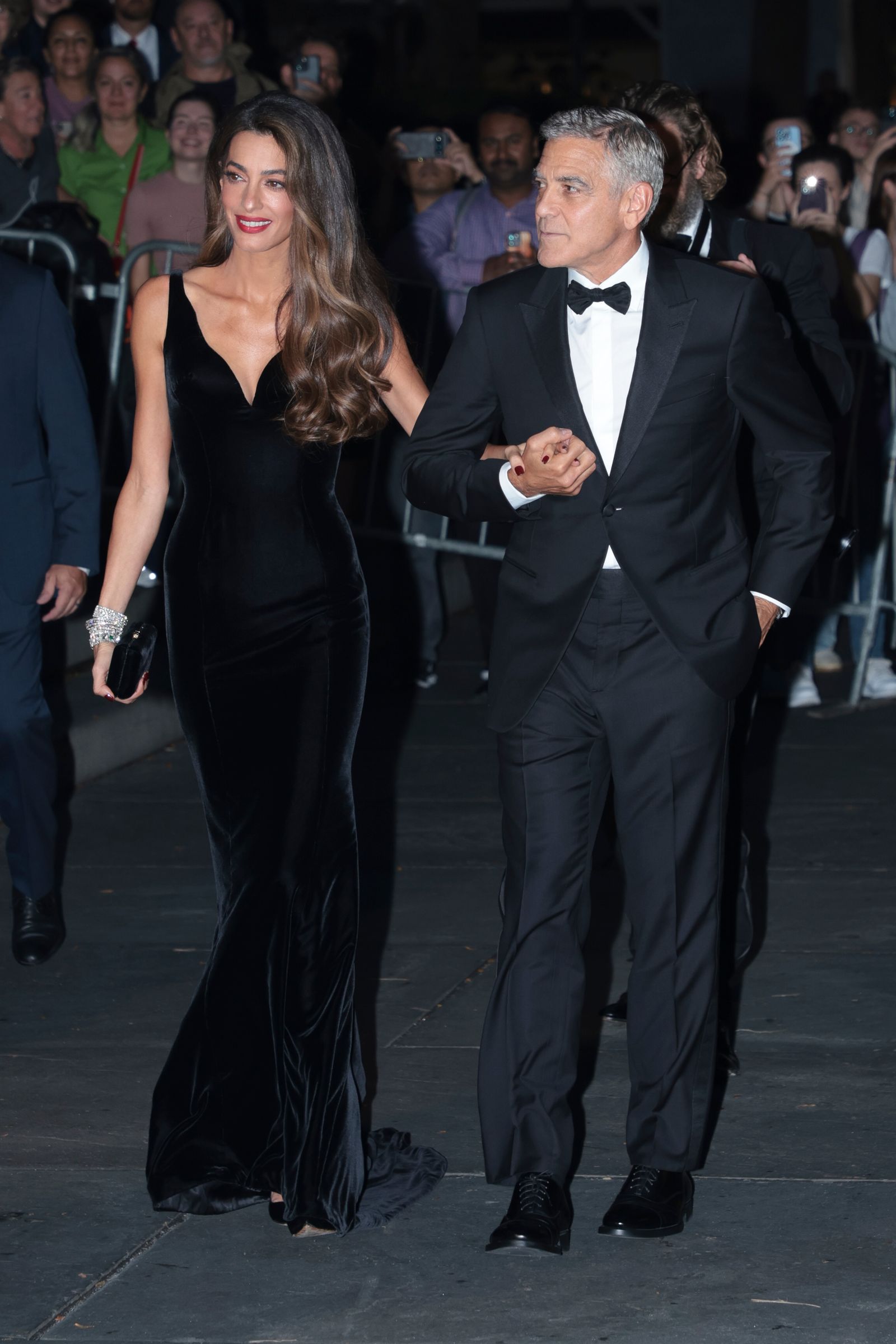Image may contain George Clooney Amal Clooney Adult Person Fashion Clothing Formal Wear Suit Accessories and Tie