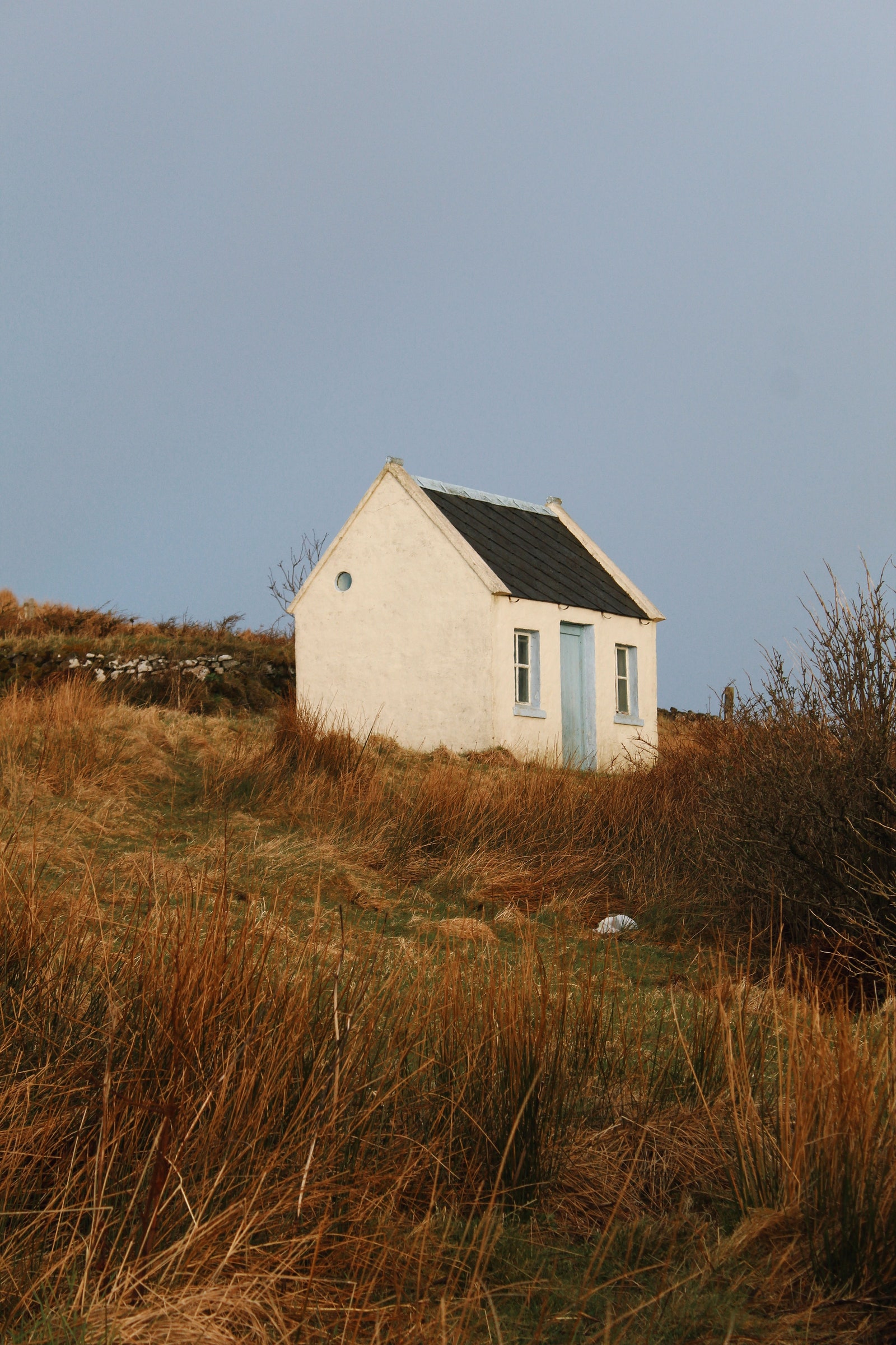 Image may contain Architecture Building Outdoors Shelter Countryside Hut Nature Rural Grass Plant and Cottage