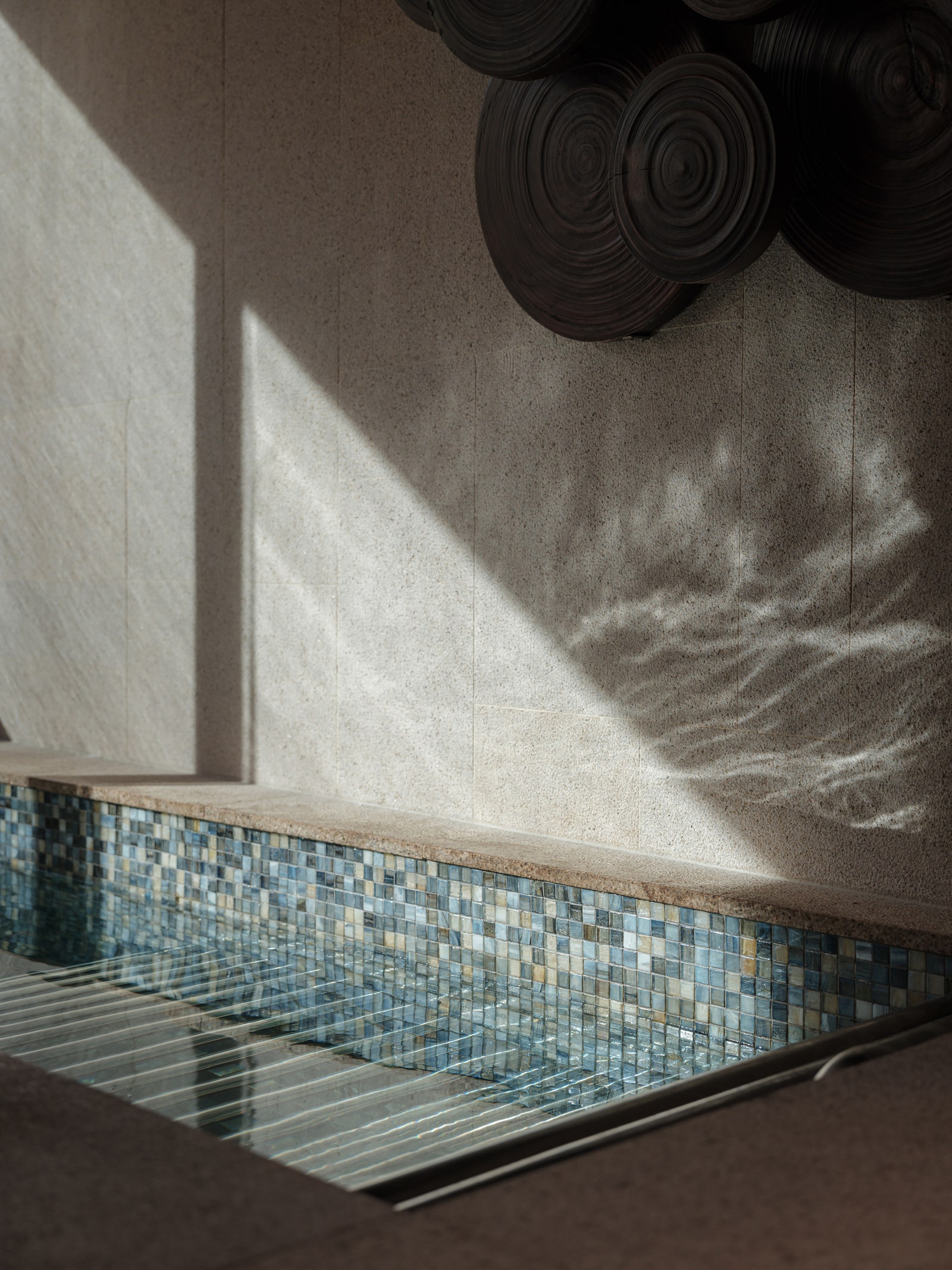 Image may contain Indoors Interior Design Machine Wheel Pool Water Swimming Pool Tub and Tile
