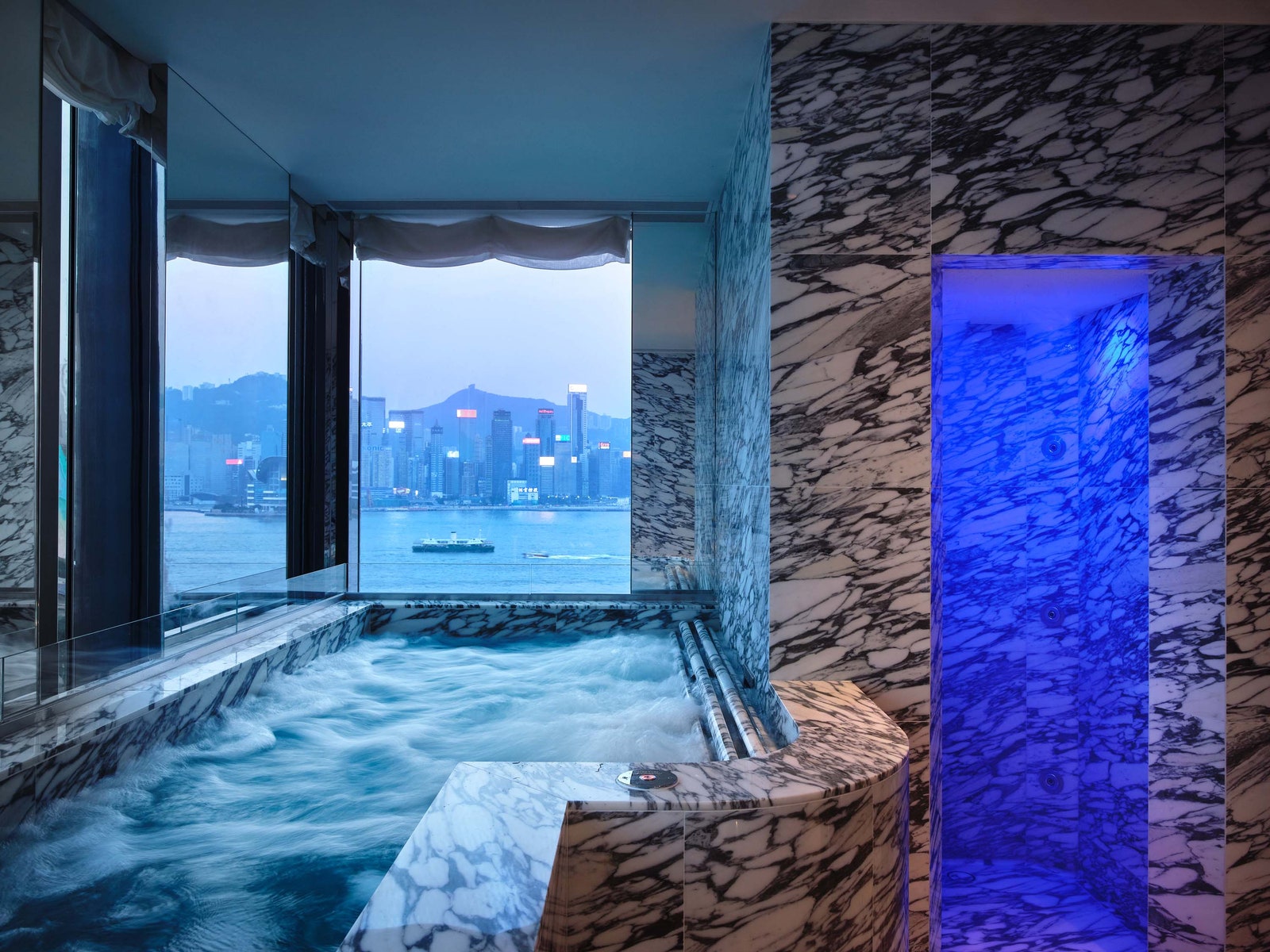 Image may contain Pool Water Swimming Pool Boat Transportation Vehicle Tub Bathing Indoors and Interior Design