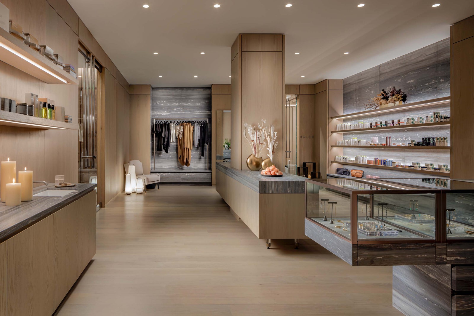 Image may contain Shop Indoors Candle Chair Furniture Sink Interior Design Sink Faucet Room and WalkIn Closet
