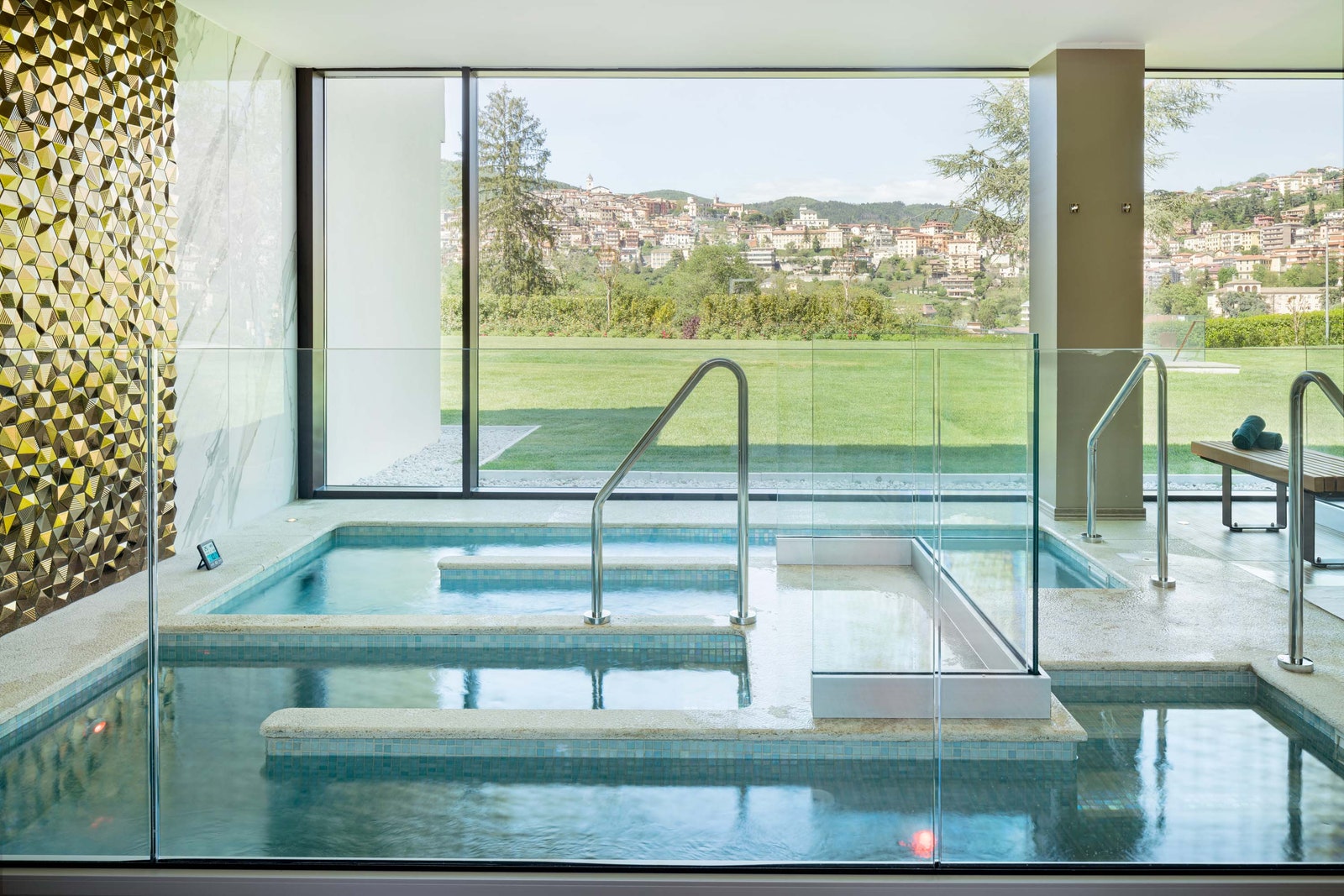 Image may contain Pool Water Indoors Interior Design Swimming Pool Tub and Bathing