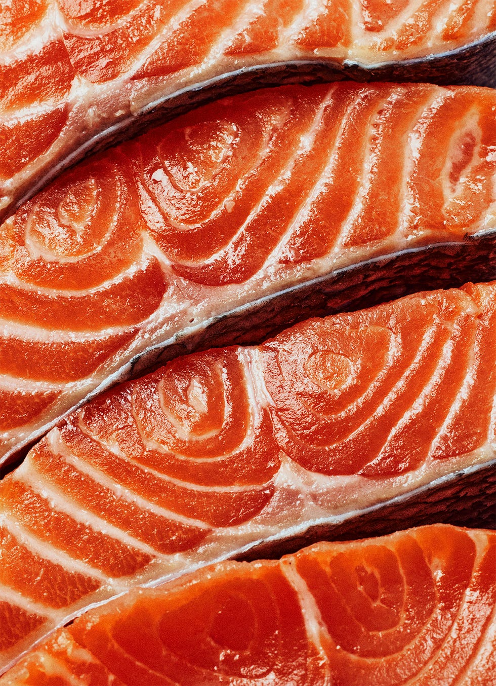 a stack of raw salmon